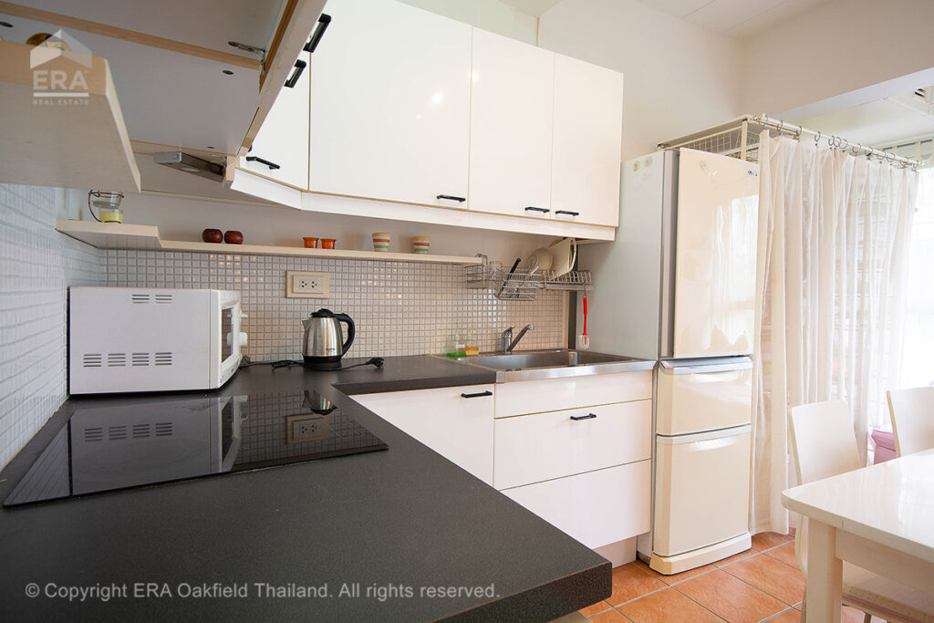 Super price!! Charming condo just 100 meters from beautiful Mae Phim Beach – beach living at its best.